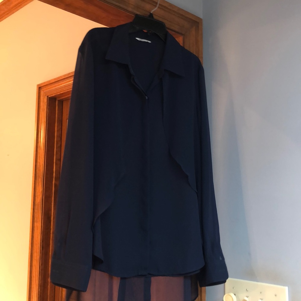 Dk blue sheet sleeves and sheer overlay over polyester blouse